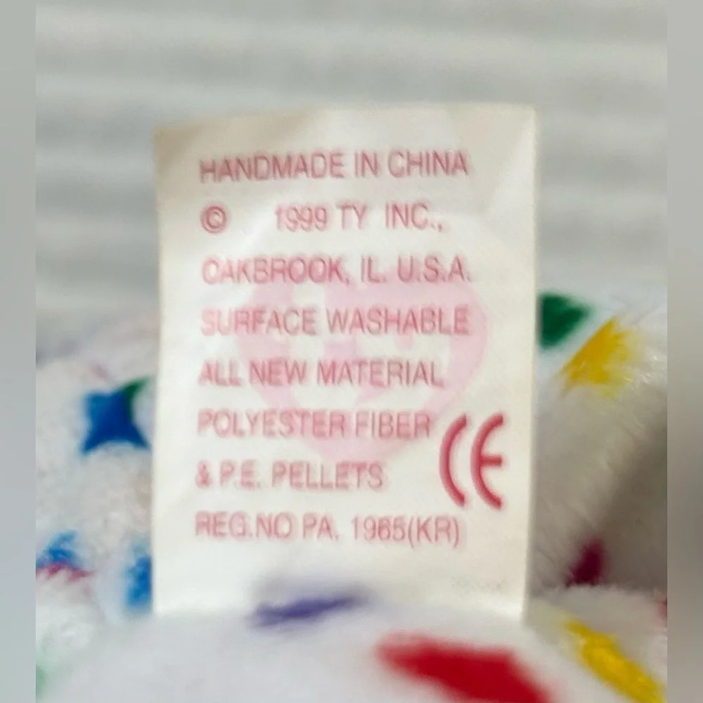 Retired, Vintage and Rare Ty Y2K Confetti Bear Beanie Baby with Errors.